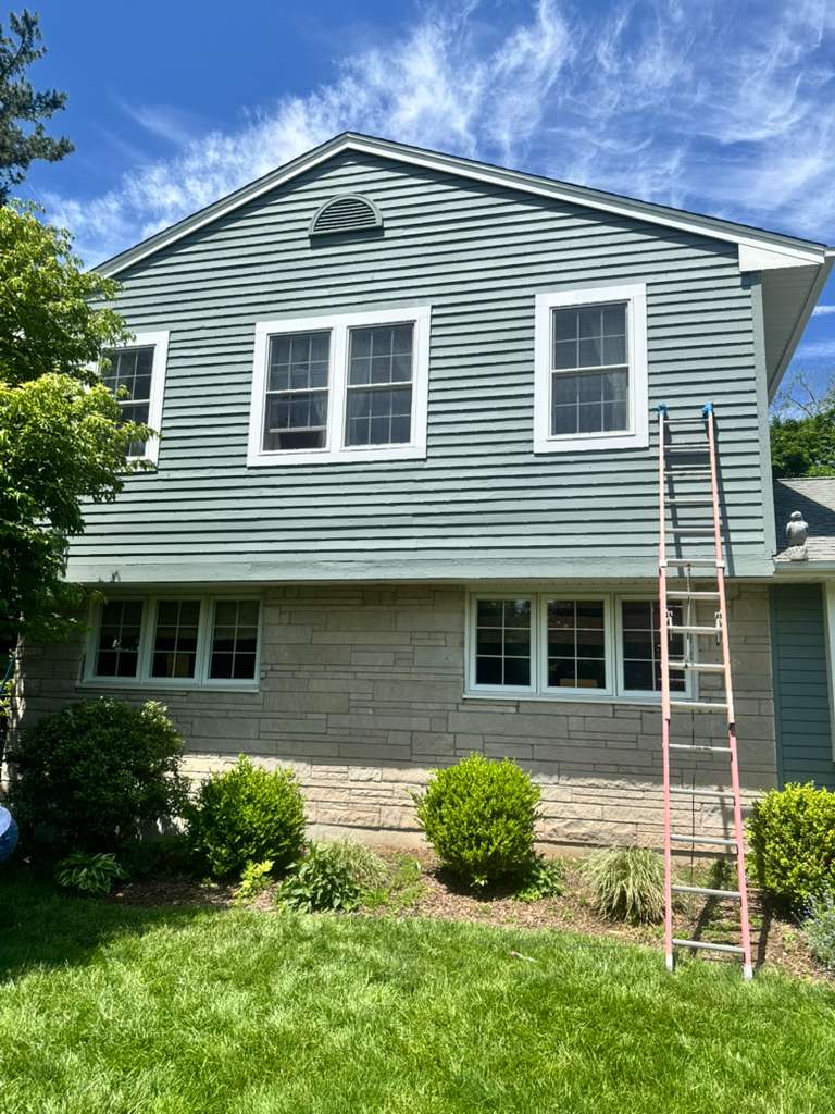 Peeling exterior paint on a Connecticut home
